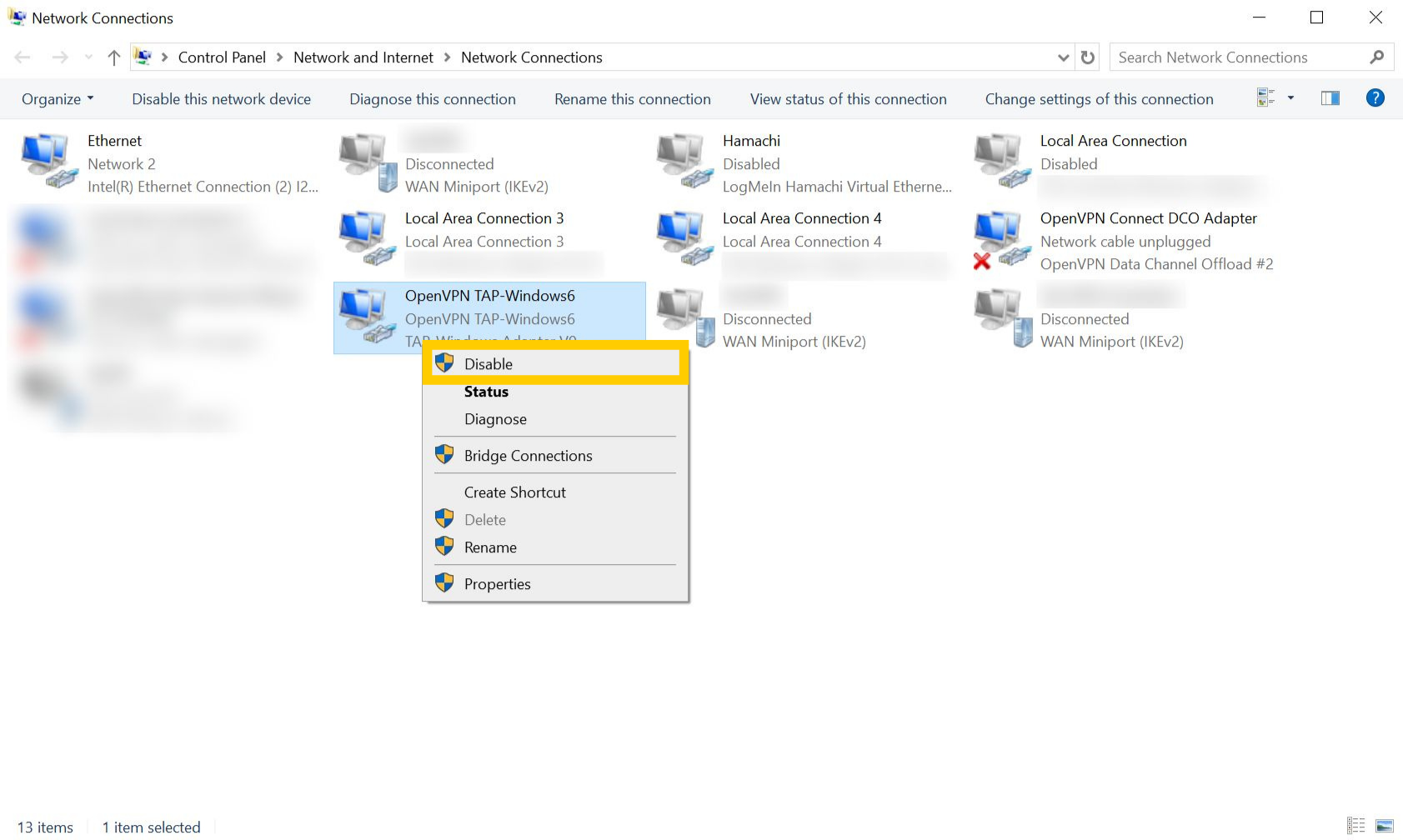 Network Connections page on Windows 10. A TAP adapter is right-clicked and the "Disable" option is highlighted.