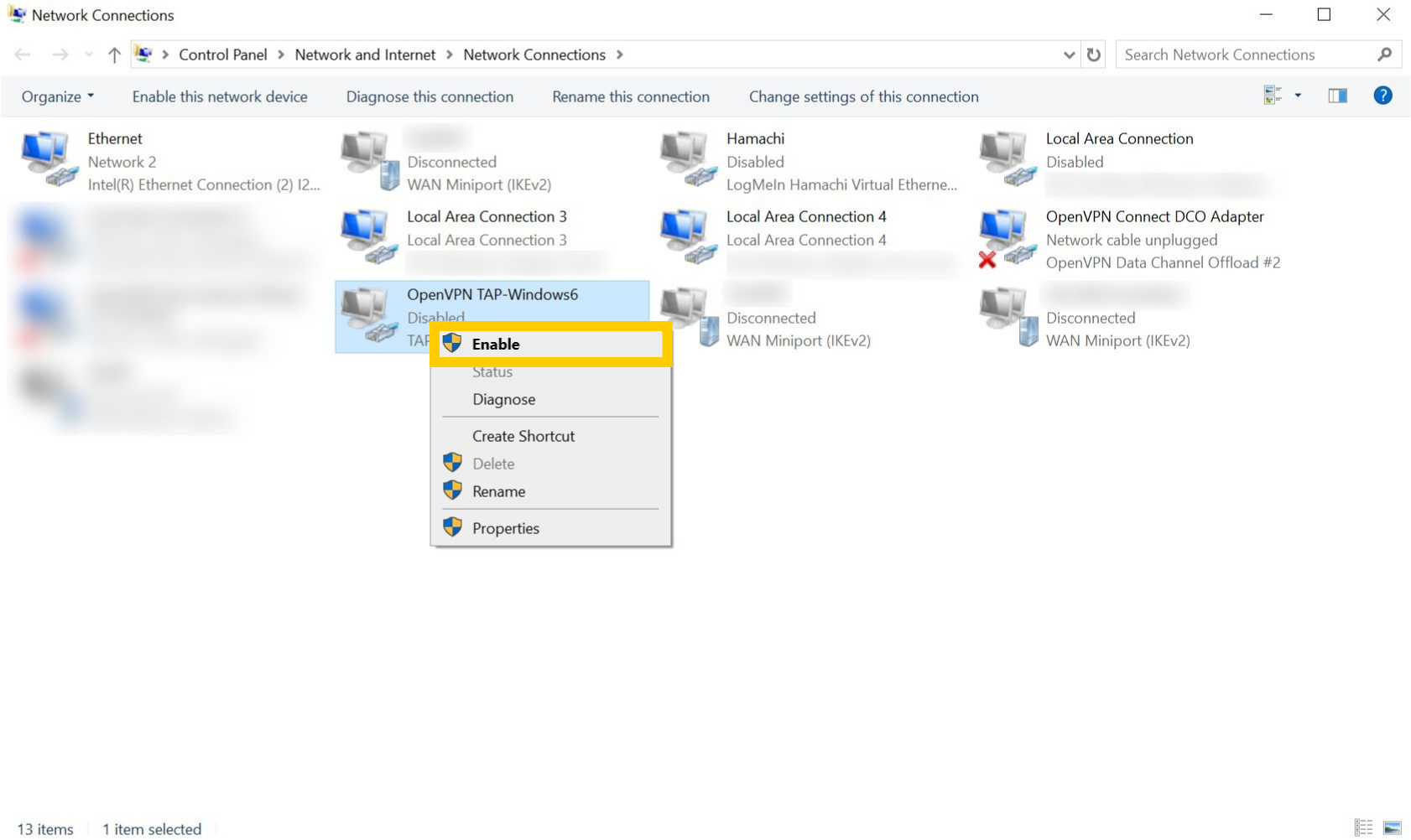Network Connections page on Windows 10. A TAP adapter is right-clicked and the "Enable" option is highlighted.