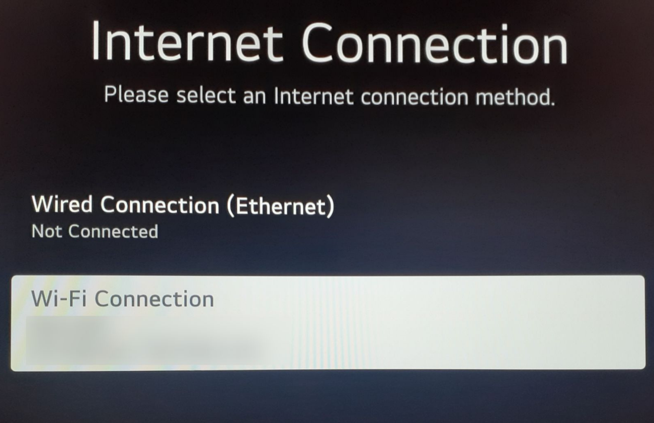 Network settings screen on an LG TV showing Wi-Fi Connection option selected.
