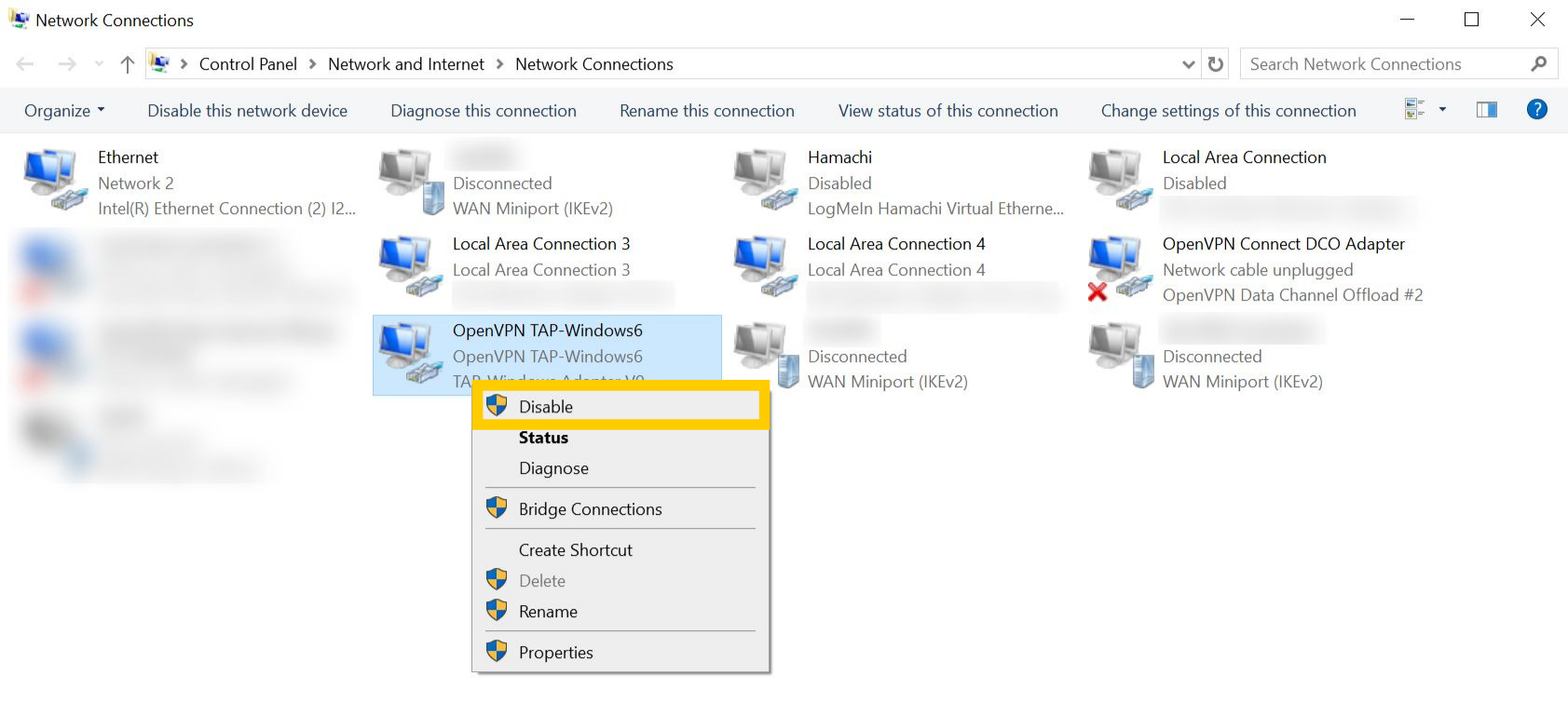 Network Connections page on Windows 10. A TAP adapter is right-clicked and the "Disable" option is highlighted.
