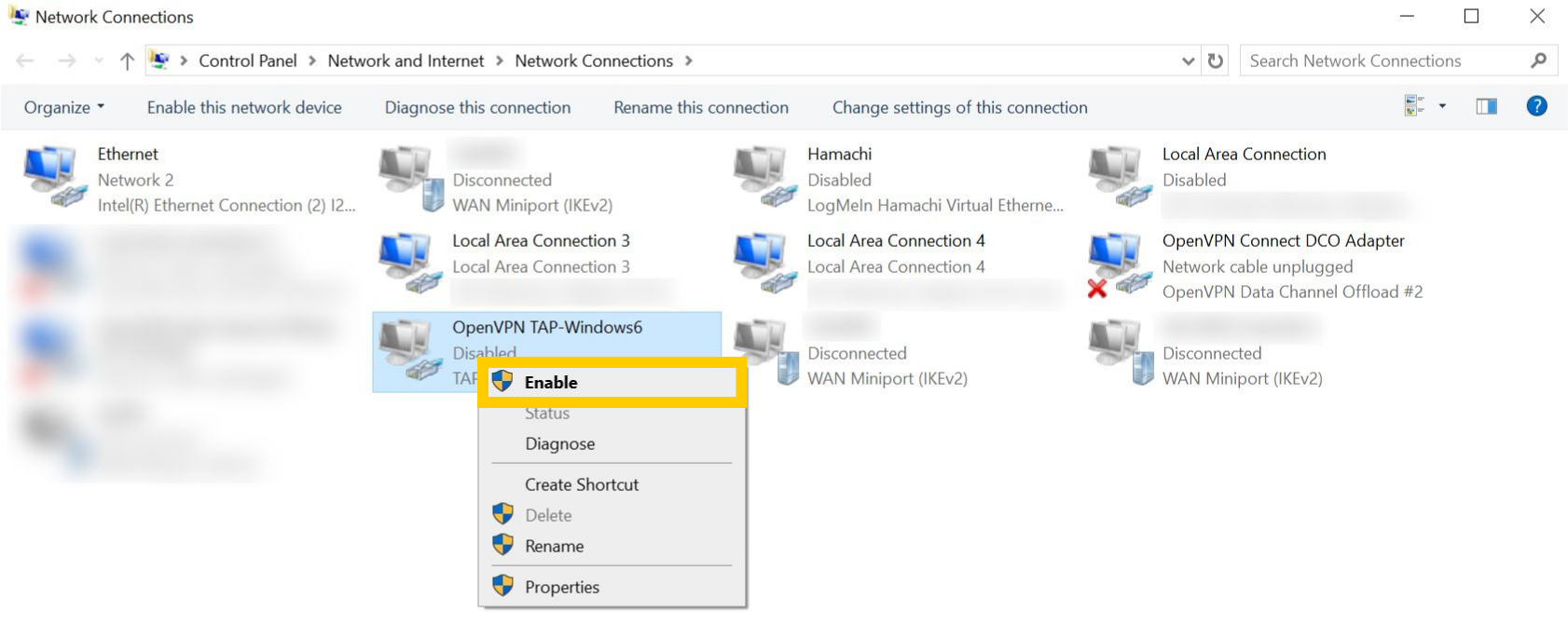 Network Connections page on Windows 10. A TAP adapter is right-clicked and the "Enable" option is highlighted.