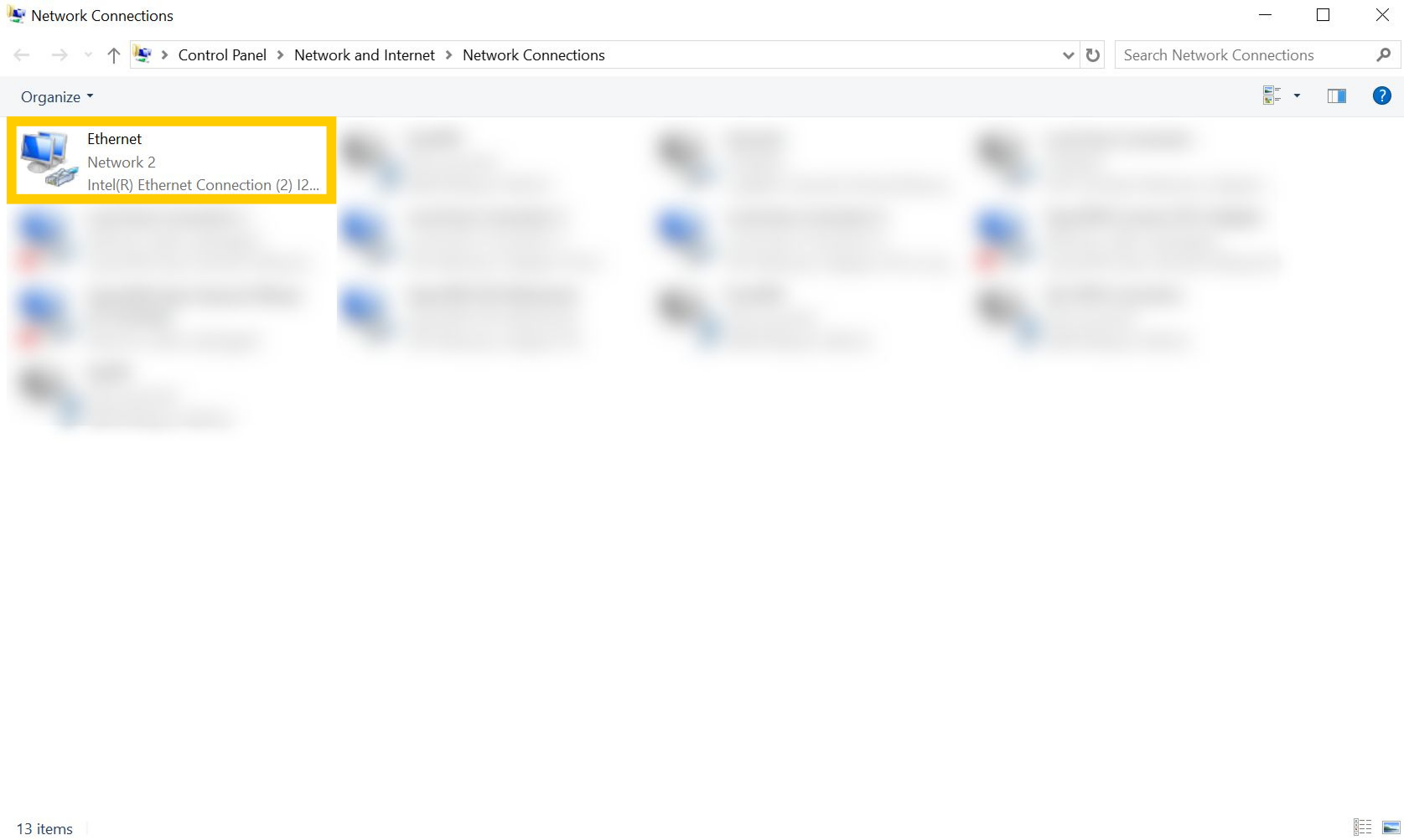 Network Connections page on Windows 10. An ethernet connection is highlighted.